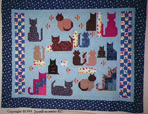 a sampler quilt of cat blocks